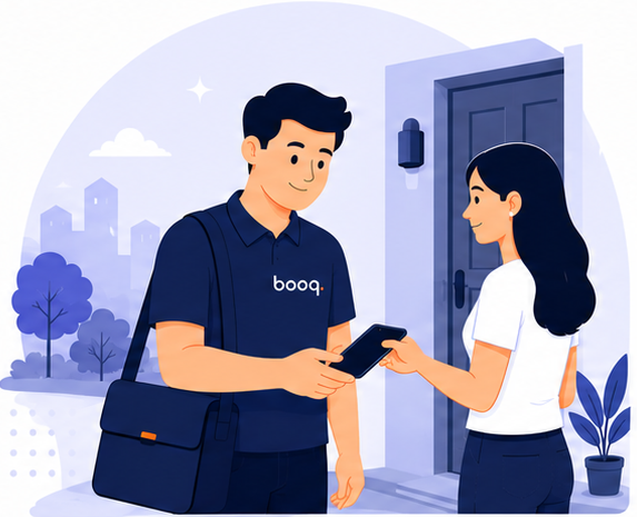 Booq technician delivering a repaired device to a customer's door